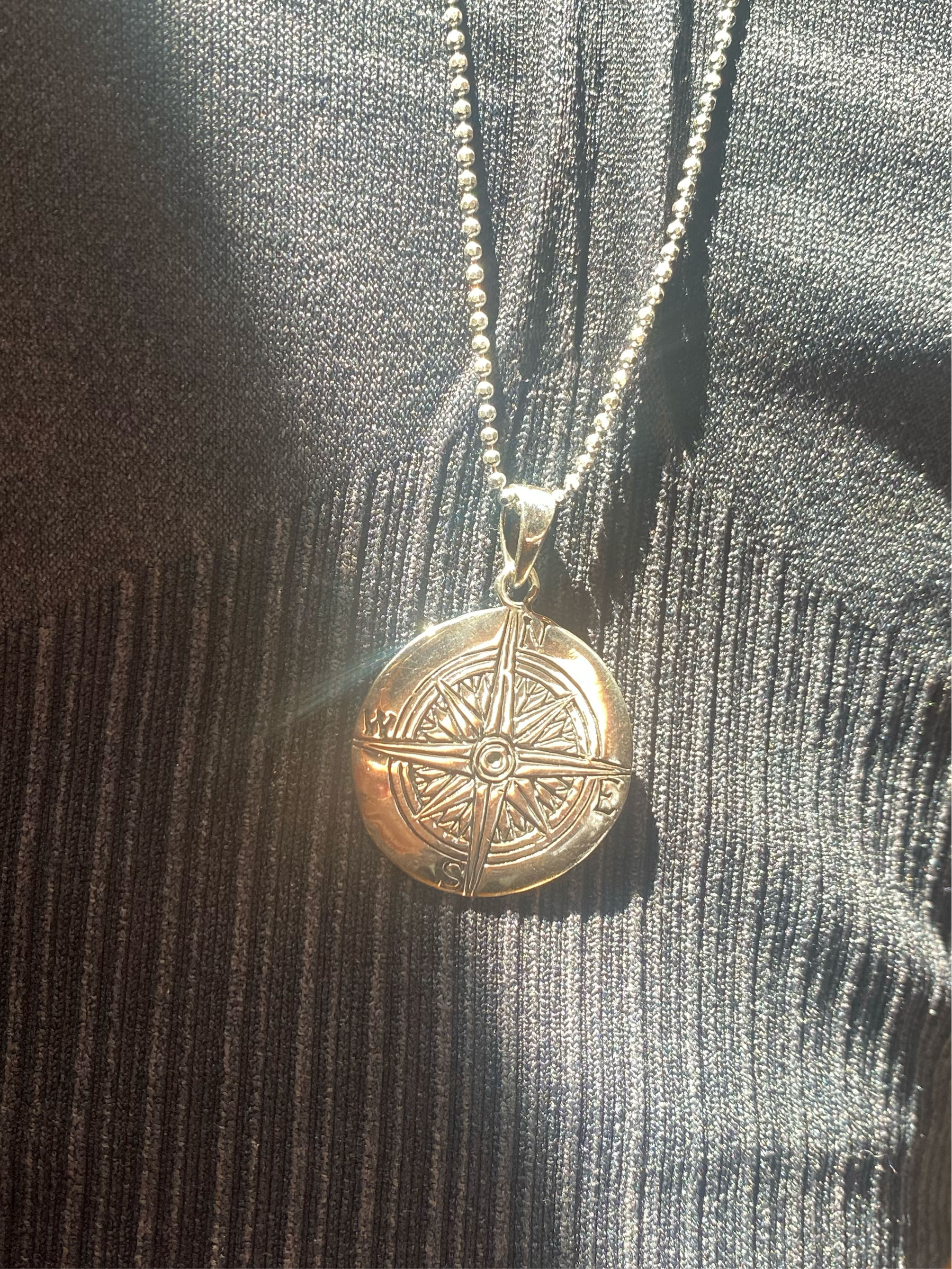 The Journey +compass medallion